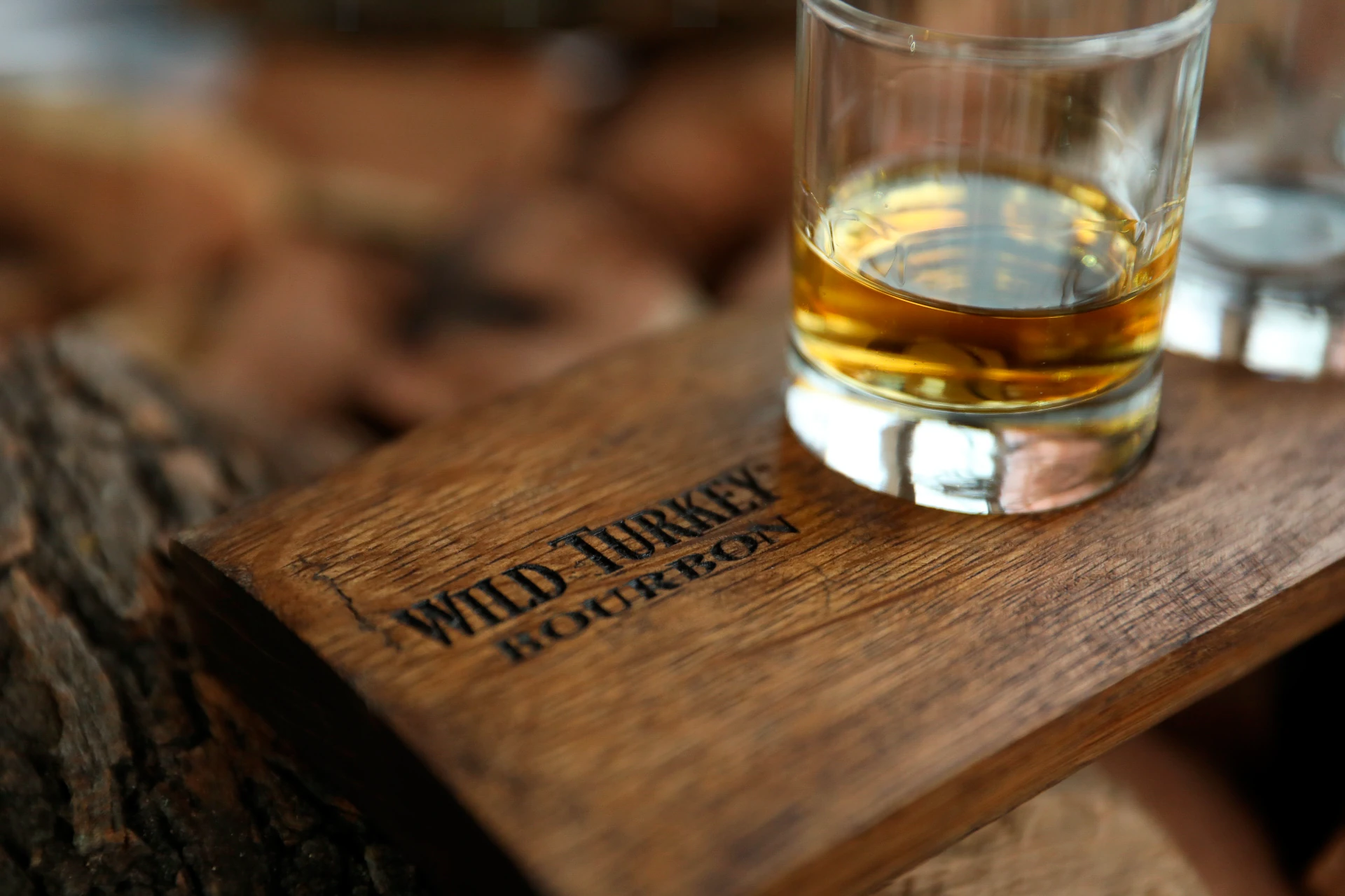 Wild Turkey Bourbon In A Glass On A Board